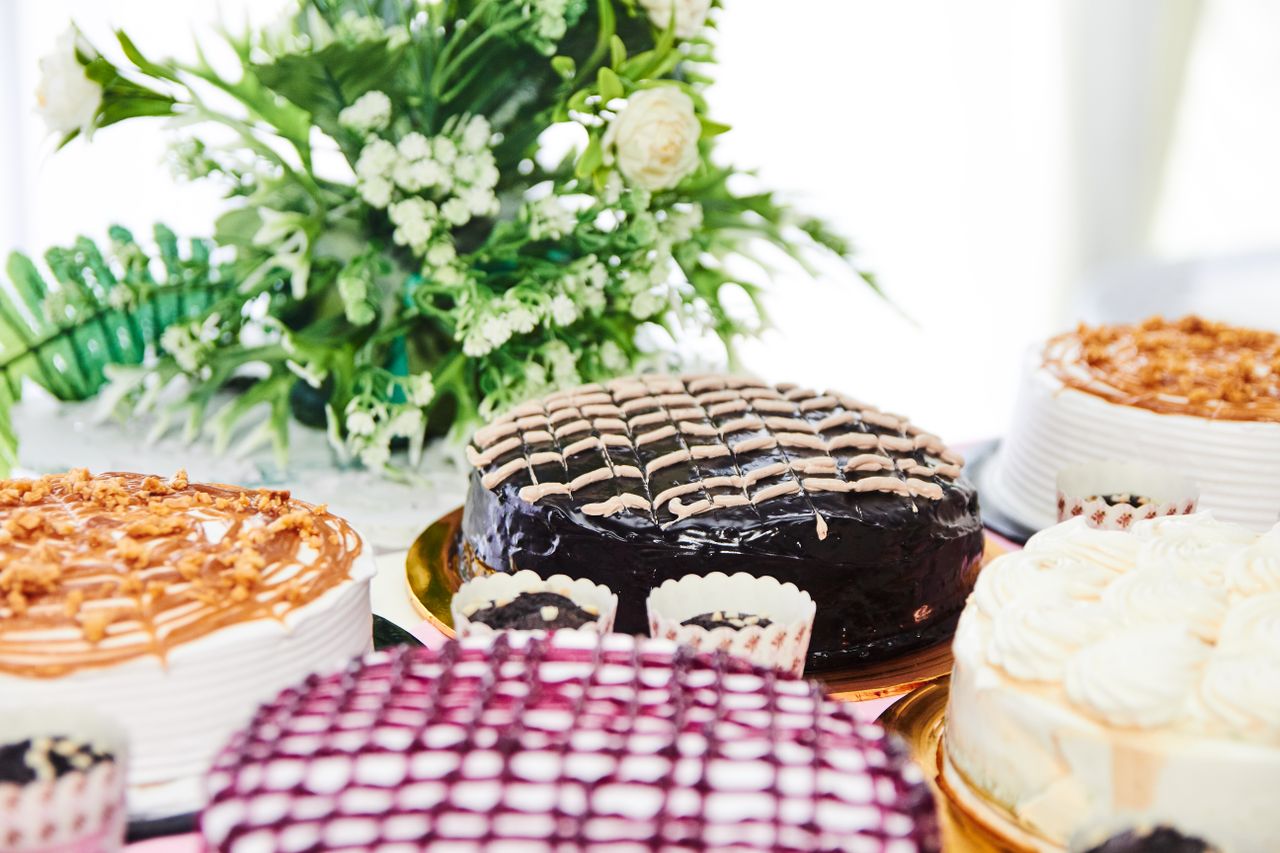 Home A variety of delicious cakes with chocolate and cream toppings, perfect for any celebration.